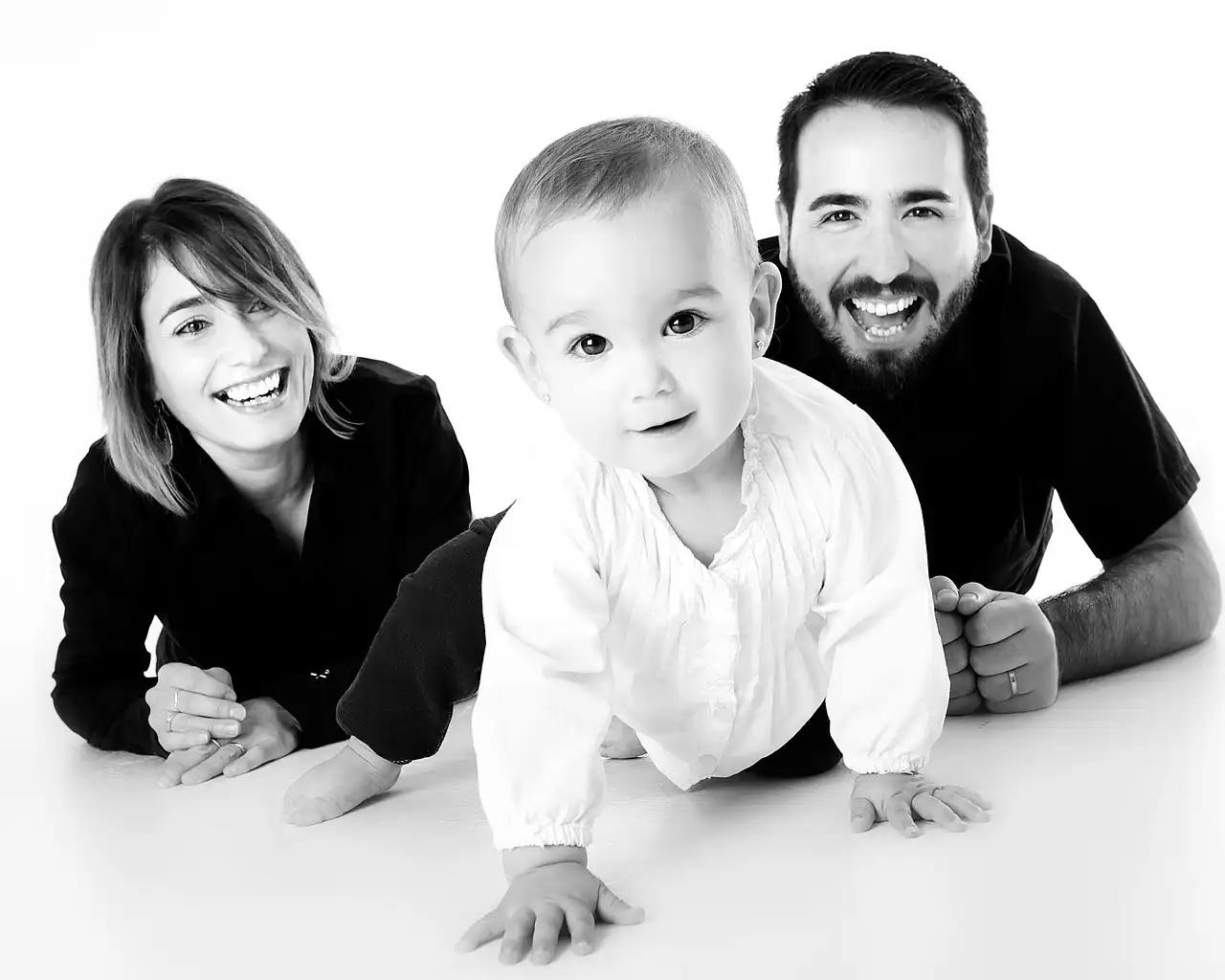 Bambino e genitori durante un Servizio Fotografico di Famiglia